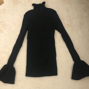 Black turtleneck with flowy sleeves